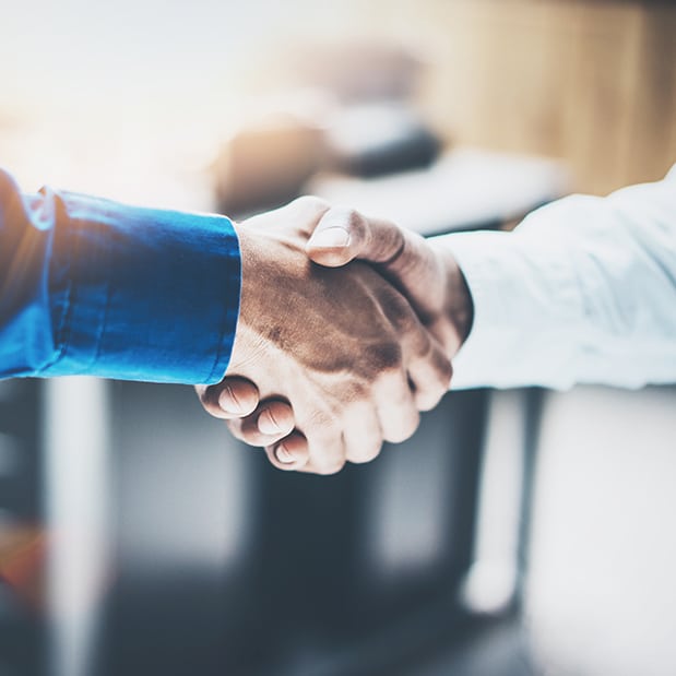 Close up view of business partnership handshake concept