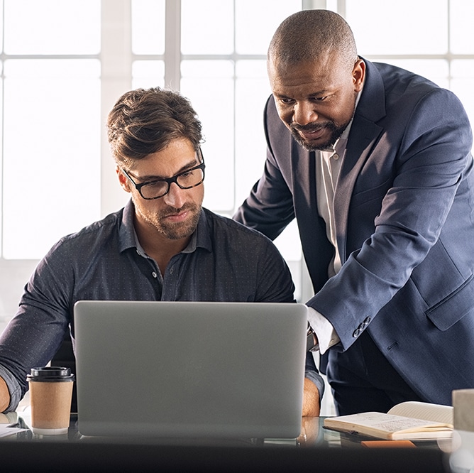 Leadership working with his employee