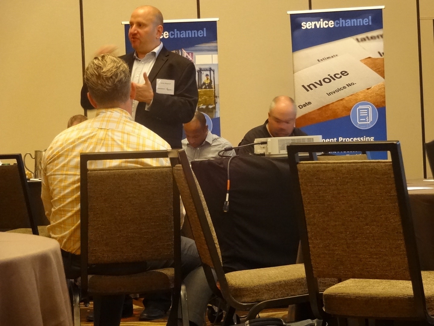 Jordan Bergtram, VP Product Mgmt, discussing FM software with ServiceChannel clients