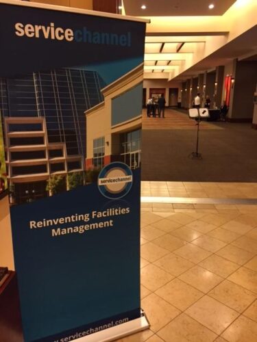 servicechannel reinventing facilities management banner at event hall