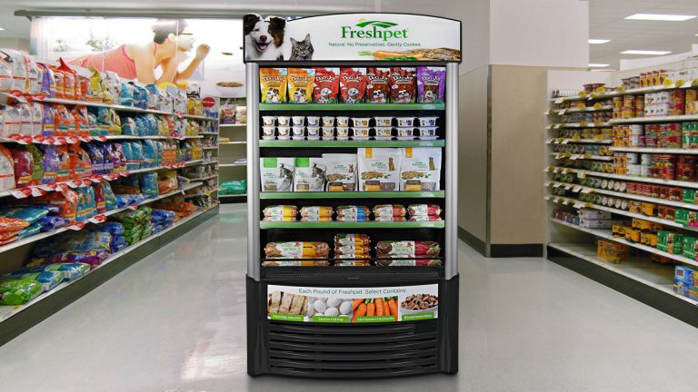 fridge in petstore offering various foods and treats for dogs and cats