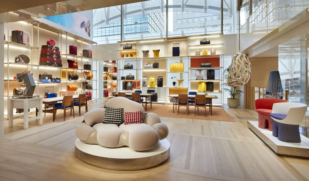 louis vuitton store interior with large oddly shaped couch in the center