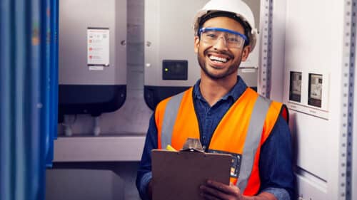 Maintenance worker with clipboard